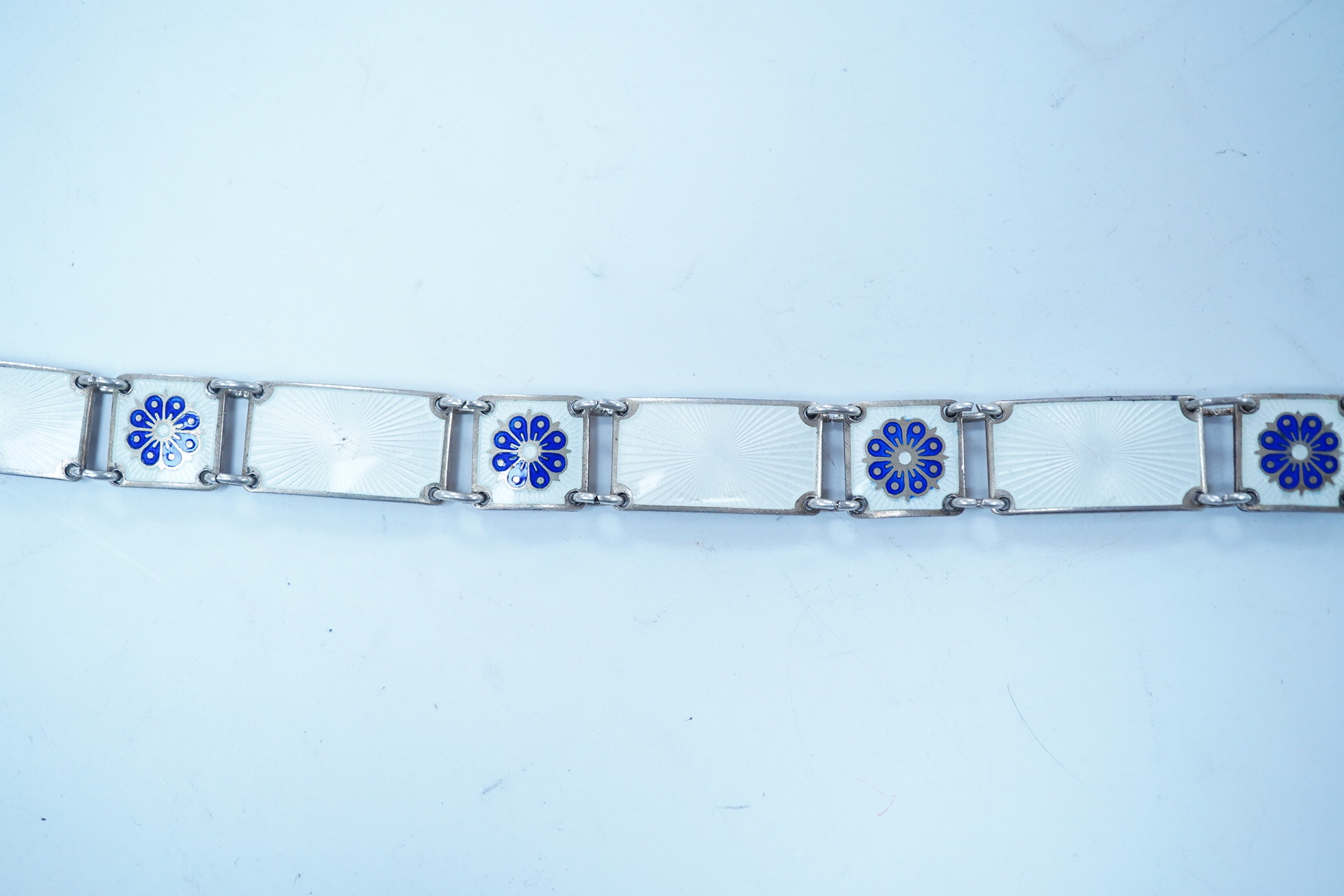 A Norwegian sterling and enamel bracelet, by David Andersen, 18.6cm. Condition - fair to good